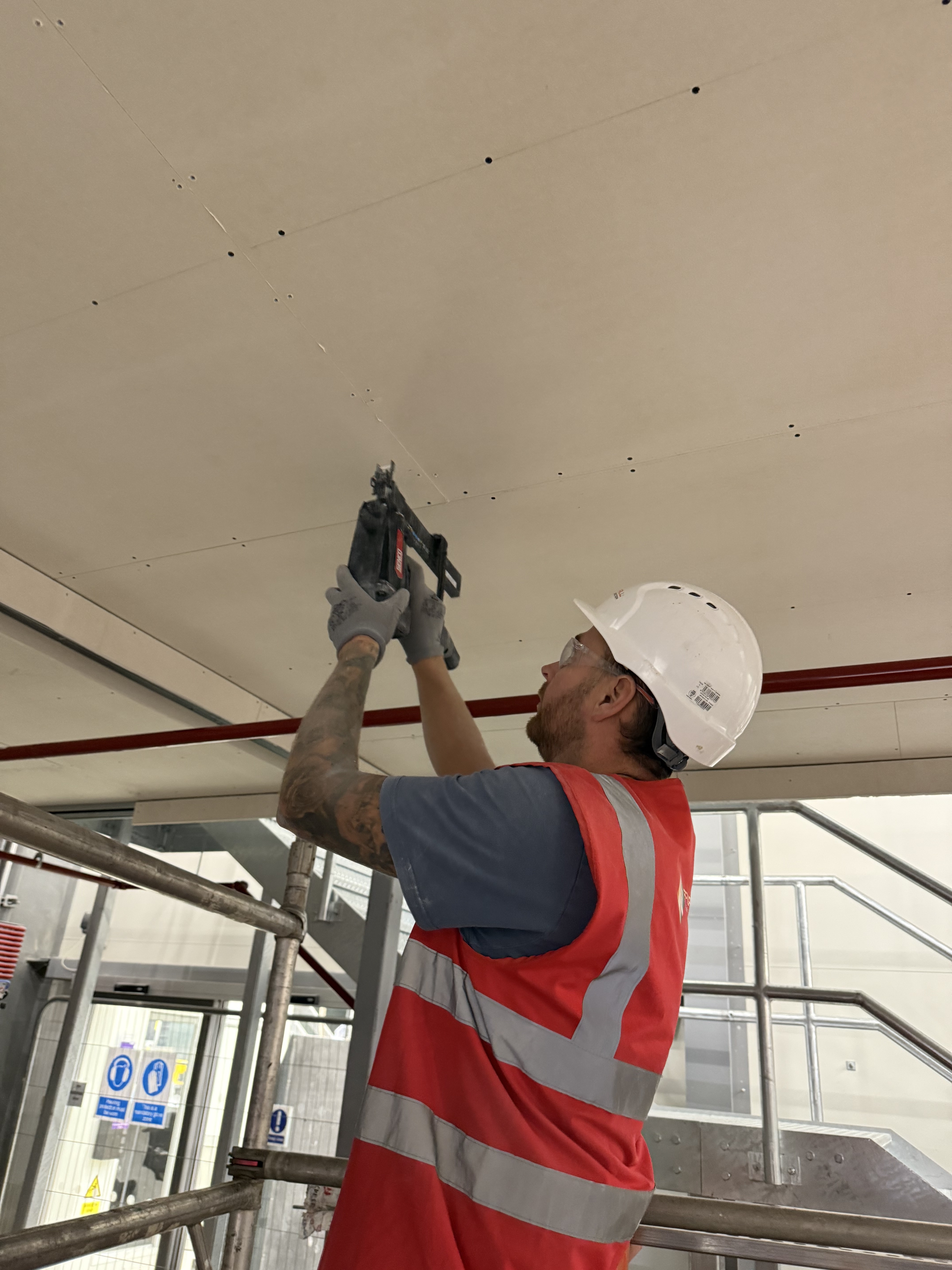 Firewall installation of a specialist 2 hour Fire Rated under drawing of a mezzanine floor 11