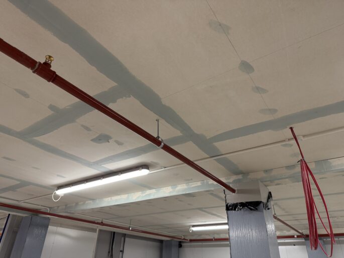 Firewall installation of a specialist 2 hour Fire Rated under drawing of a mezzanine floor 15